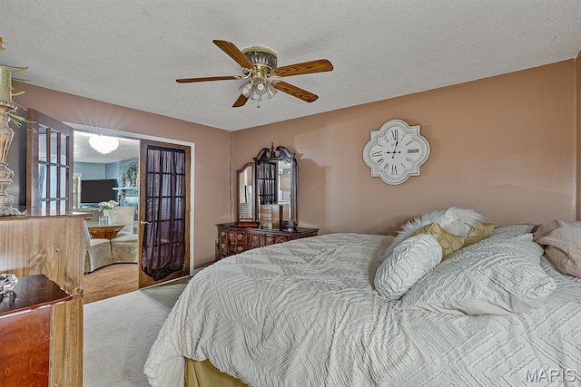 17504 Division St, Kennett, MO 63857 - bedroom featuring a textured ceiling and ceiling fan