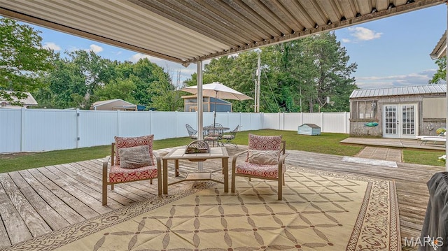 17504 Division St, Kennett, MO 63857 - view of patio / terrace with french doors, a deck, and outdoor dining space