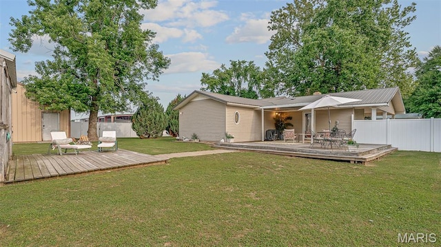 17504 Division St, Kennett, MO 63857 - rear view of house with a deck