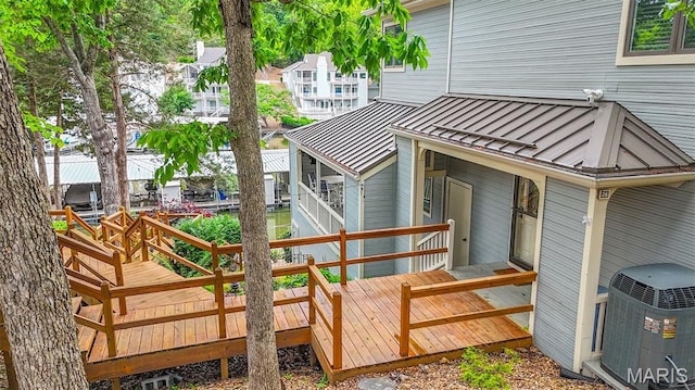 6620 Lake Point Dr Unit 26, Osage Beach, MO 65065 - wooden terrace featuring central AC unit
