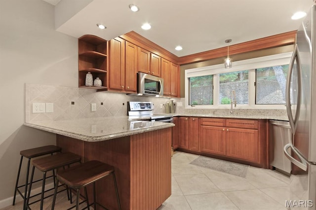 6620 Lake Point Dr Unit 26, Osage Beach, MO 65065 - kitchen with stainless steel appliances, a peninsula, tasteful backsplash, light stone countertops, and open shelves