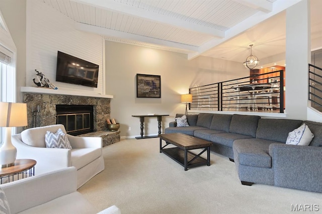 6620 Lake Point Dr Unit 26, Osage Beach, MO 65065 - carpeted living room with beam ceiling, a fireplace, baseboards, and a chandelier