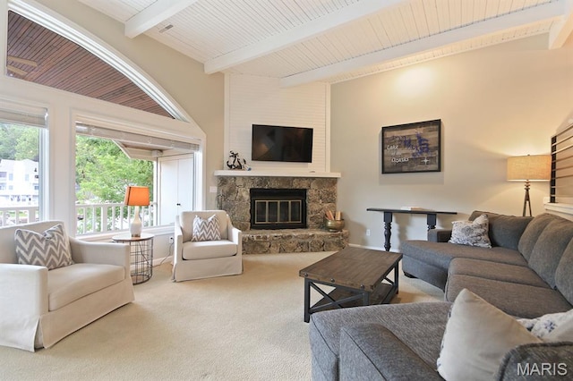 6620 Lake Point Dr Unit 26, Osage Beach, MO 65065 - carpeted living area featuring beam ceiling and a fireplace