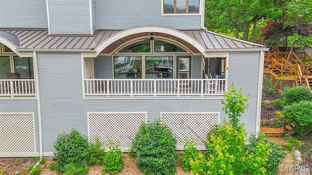 6620 Lake Point Dr Unit 26, Osage Beach, MO 65065 - view of side of property with a standing seam roof and metal roof
