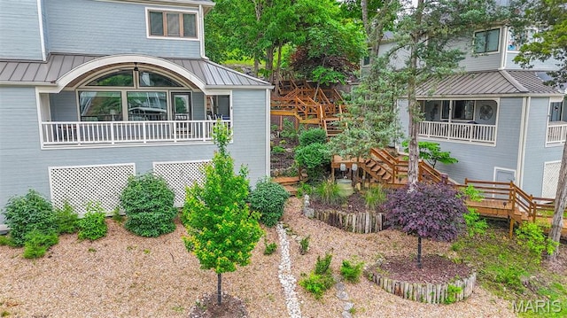 6620 Lake Point Dr Unit 26, Osage Beach, MO 65065 - view of property exterior featuring a standing seam roof and metal roof