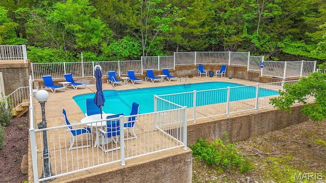 6620 Lake Point Dr Unit 26, Osage Beach, MO 65065 - community pool with a patio area