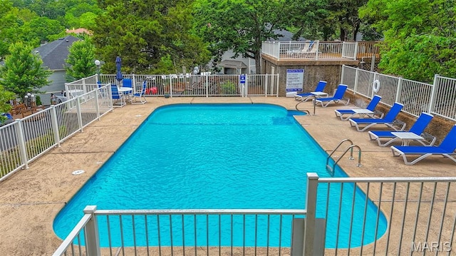 6620 Lake Point Dr Unit 26, Osage Beach, MO 65065 - community pool featuring a patio area