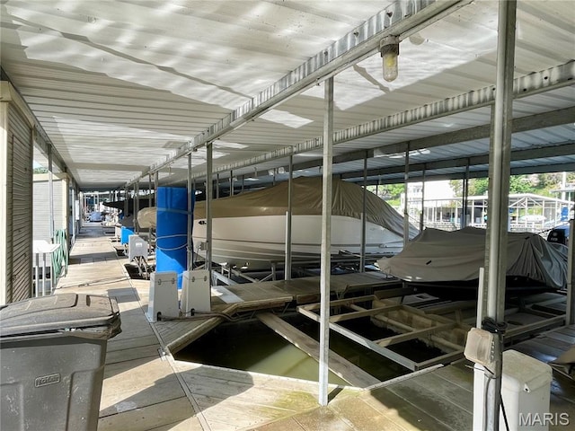 6620 Lake Point Dr Unit 26, Osage Beach, MO 65065 - dock area featuring boat lift