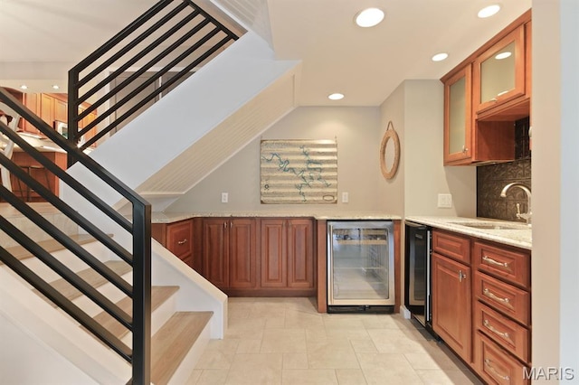 6620 Lake Point Dr Unit 26, Osage Beach, MO 65065 - indoor wet bar featuring wine cooler, recessed lighting, stairway, and decorative backsplash
