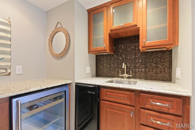 6620 Lake Point Dr Unit 26, Osage Beach, MO 65065 - indoor wet bar with beverage cooler, backsplash, and fridge