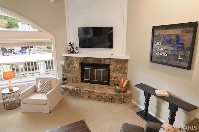 6620 Lake Point Dr Unit 26, Osage Beach, MO 65065 - carpeted living area with a fireplace