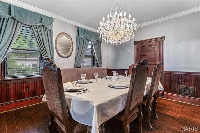 698N 3rd St, Saint Genevieve, MO 63670 - dining room with hardwood / wood-style flooring, a chandelier, wooden walls, ornamental molding, and a wainscoted wall