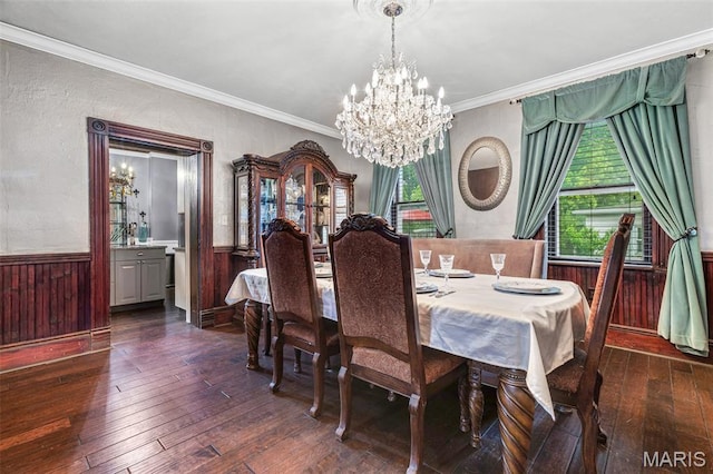 698N 3rd St, Saint Genevieve, MO 63670 - dining area with a chandelier, wainscoting, dark wood-style flooring, crown molding, and wooden walls