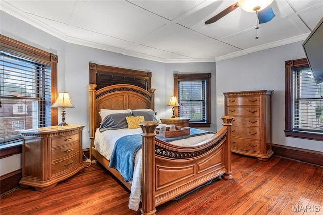 698N 3rd St, Saint Genevieve, MO 63670 - bedroom featuring multiple windows, dark wood-style flooring, a ceiling fan, and ornamental molding