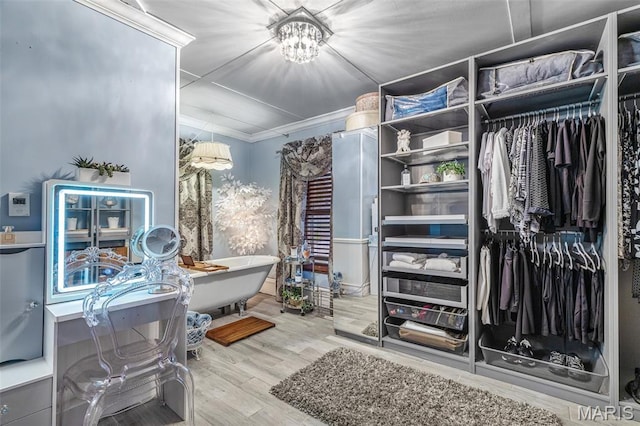 698N 3rd St, Saint Genevieve, MO 63670 - spacious closet with a chandelier and wood finished floors