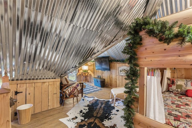 698N 3rd St, Saint Genevieve, MO 63670 - bedroom featuring wood finished floors and wooden walls