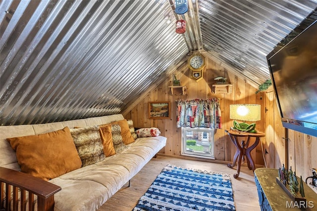 698N 3rd St, Saint Genevieve, MO 63670 - living area featuring vaulted ceiling, wood walls, and wood-type flooring