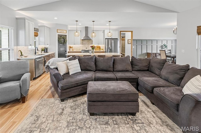 8353 Maple Grove Rd, Troy, IL 62294 - living room with lofted ceiling, light wood-type flooring, a chandelier, and recessed lighting