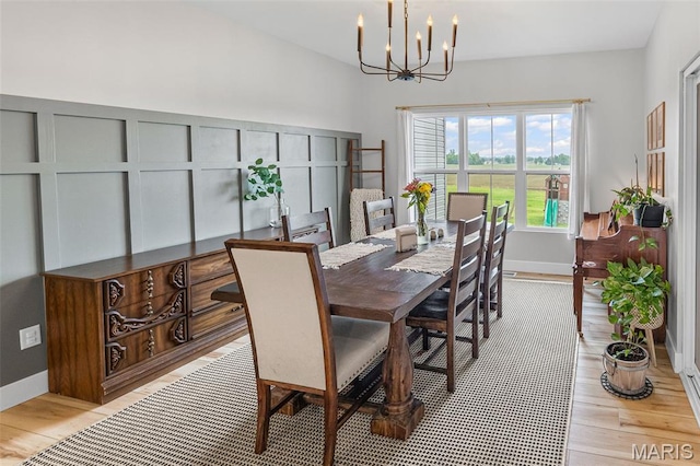 8353 Maple Grove Rd, Troy, IL 62294 - dining area featuring a chandelier and light wood finished floors