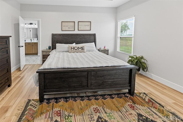 8353 Maple Grove Rd, Troy, IL 62294 - bedroom with light wood-type flooring and ensuite bathroom