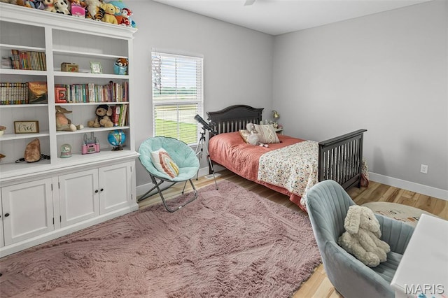 8353 Maple Grove Rd, Troy, IL 62294 - bedroom with light wood-style floors and baseboards
