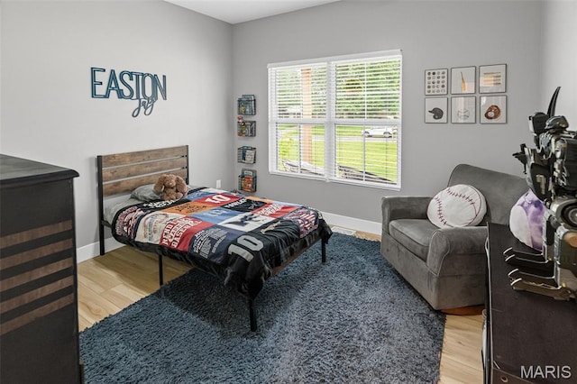 8353 Maple Grove Rd, Troy, IL 62294 - bedroom featuring light wood-style floors and baseboards