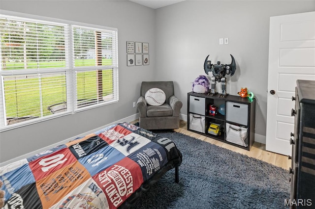 8353 Maple Grove Rd, Troy, IL 62294 - bedroom featuring baseboards and wood finished floors