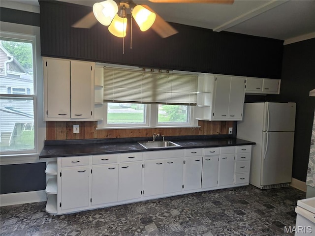 107 N 18th St, Belleville, IL 62226 - kitchen with open shelves, freestanding refrigerator, and a sink