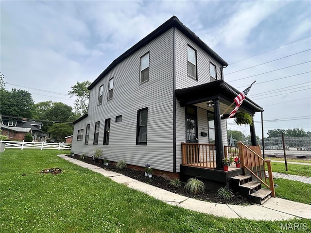 107 N 18th St, Belleville, IL 62226 - view of side of property featuring a porch