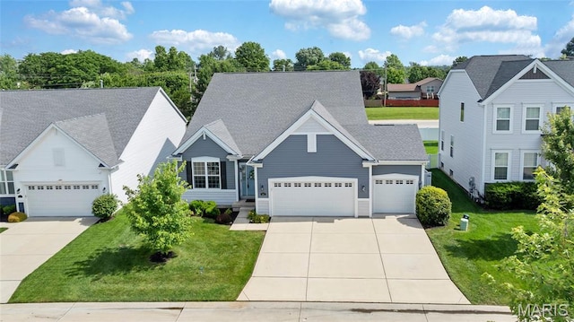 803 Brimley Dr, Cottleville, MO 63304 - traditional home featuring driveway, an attached garage, and a front lawn