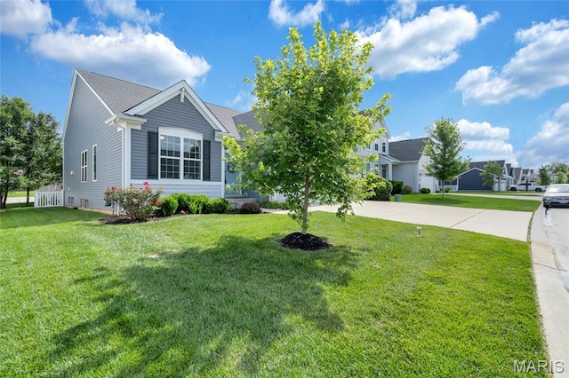 803 Brimley Dr, Cottleville, MO 63304 - view of front of house with driveway and a front lawn