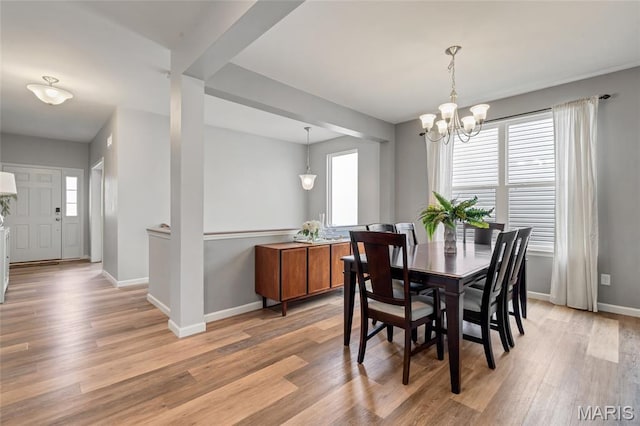 803 Brimley Dr, Cottleville, MO 63304 - dining area with light wood finished floors and a chandelier