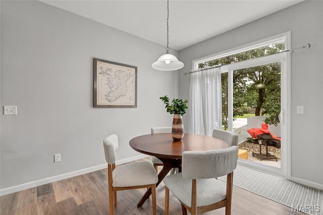 803 Brimley Dr, Cottleville, MO 63304 - dining space with baseboards and light wood-style flooring