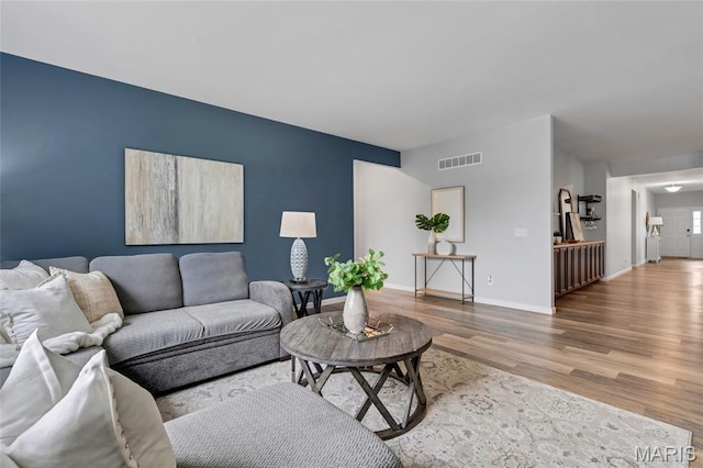803 Brimley Dr, Cottleville, MO 63304 - living room featuring wood finished floors and baseboards