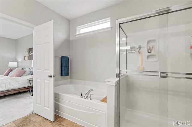 803 Brimley Dr, Cottleville, MO 63304 - bathroom featuring a garden tub, ensuite bath, and a shower stall