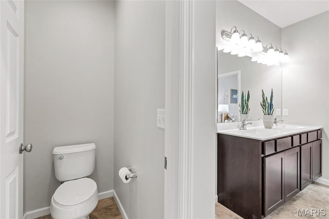 803 Brimley Dr, Cottleville, MO 63304 - bathroom with toilet and double vanity