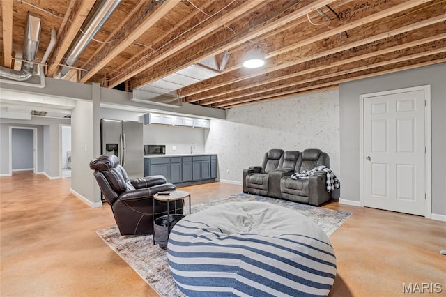 803 Brimley Dr, Cottleville, MO 63304 - living room featuring concrete floors and baseboards
