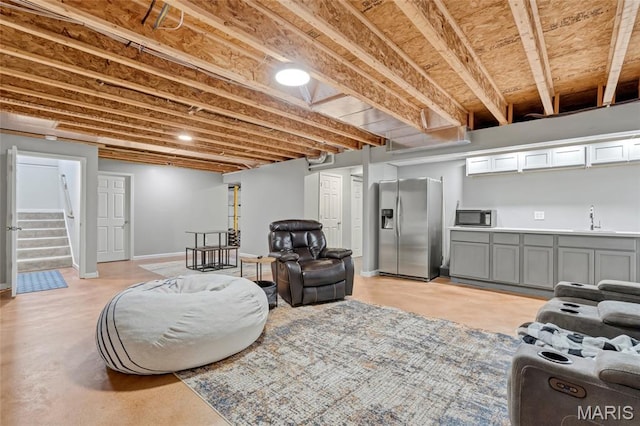 803 Brimley Dr, Cottleville, MO 63304 - living area featuring stairway and baseboards