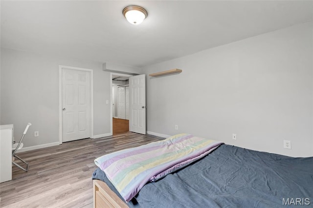 803 Brimley Dr, Cottleville, MO 63304 - bedroom with wood finished floors and baseboards