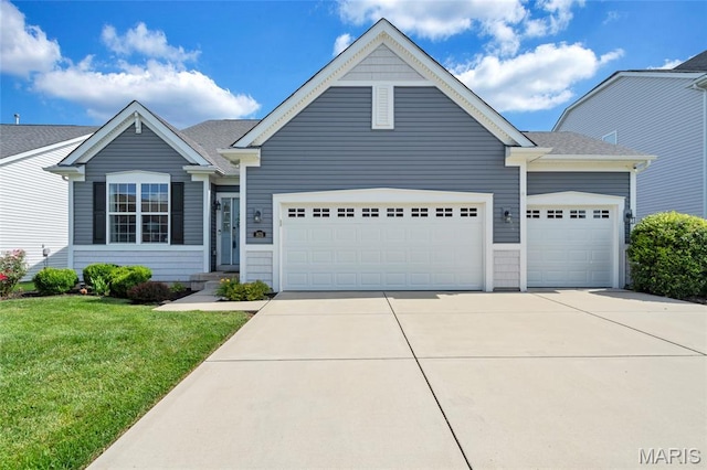 803 Brimley Dr, Cottleville, MO 63304 - view of front facade with an attached garage, driveway, and a front lawn