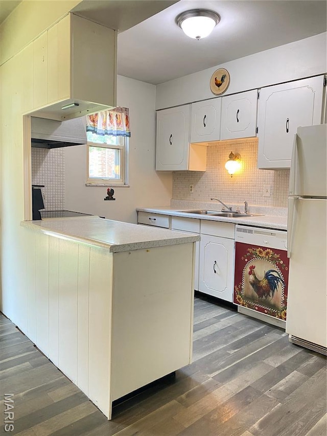 3122 Carnaby Ln Unit C, Bridgeton, MO 63044 - kitchen featuring white appliances, wood finished floors, light countertops, and white cabinets