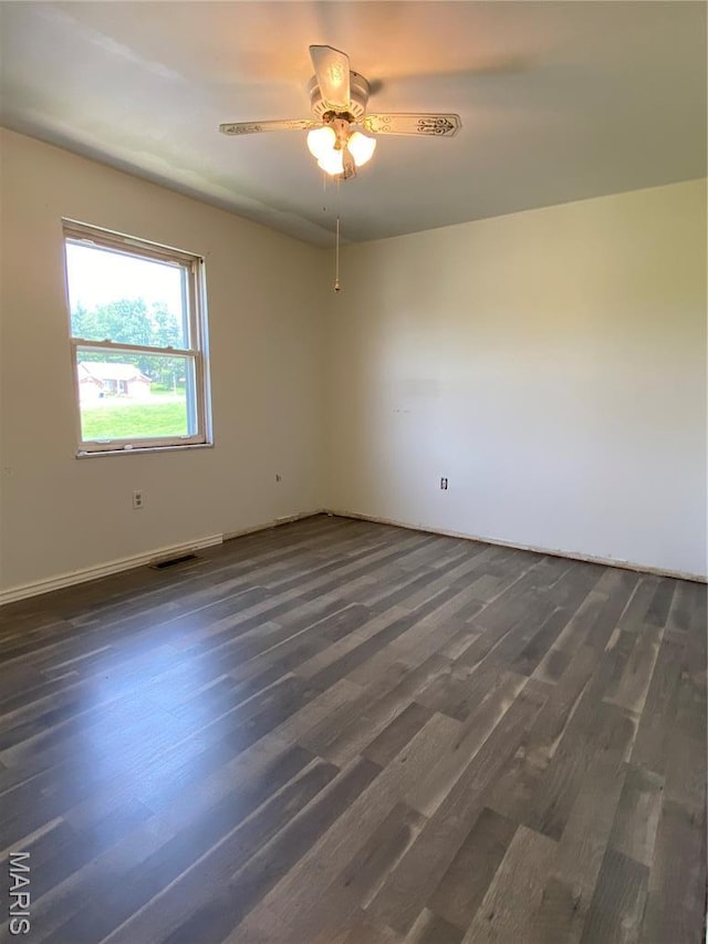 3122 Carnaby Ln Unit C, Bridgeton, MO 63044 - empty room featuring dark wood-style flooring and ceiling fan