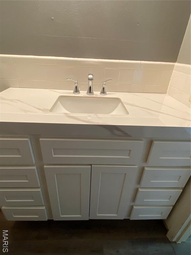 3122 Carnaby Ln Unit C, Bridgeton, MO 63044 - bathroom with vanity and wood finished floors