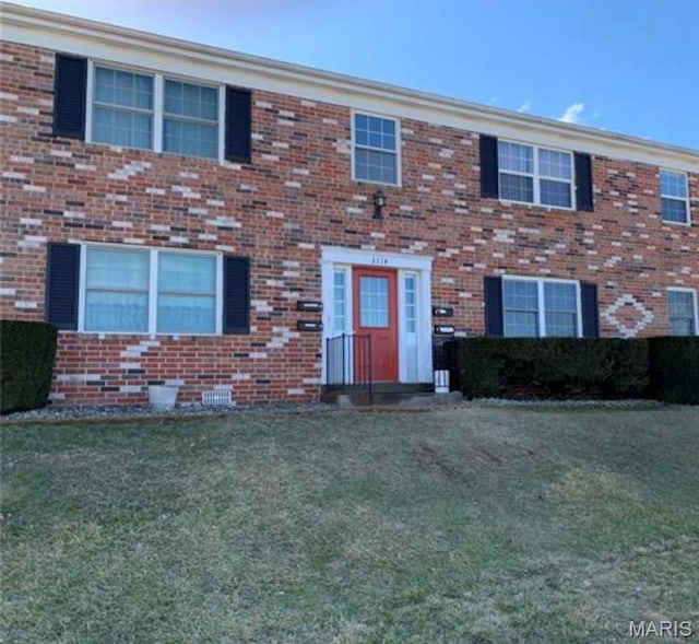 3122 Carnaby Ln Unit C, Bridgeton, MO 63044 - view of front of property featuring a front lawn and brick siding