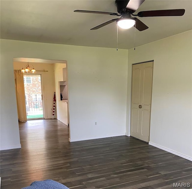 3122 Carnaby Ln Unit C, Bridgeton, MO 63044 - unfurnished room with a chandelier, dark wood-style flooring, and a ceiling fan