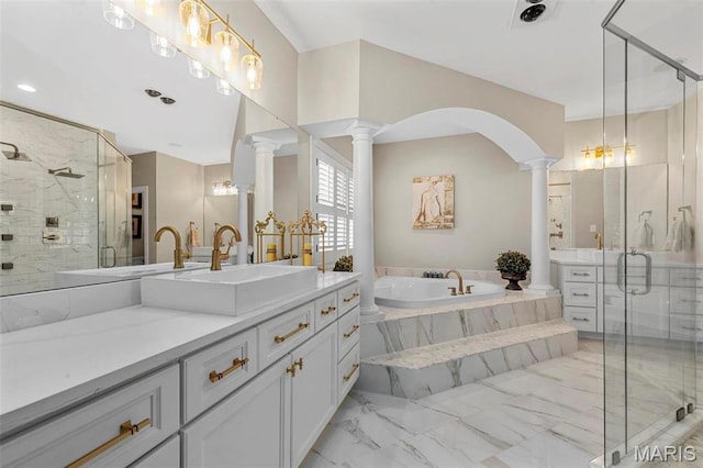 1315 Wildhorse Meadows Dr, Chesterfield, MO 63005 - full bathroom with decorative columns, vanity, a garden tub, and a shower stall