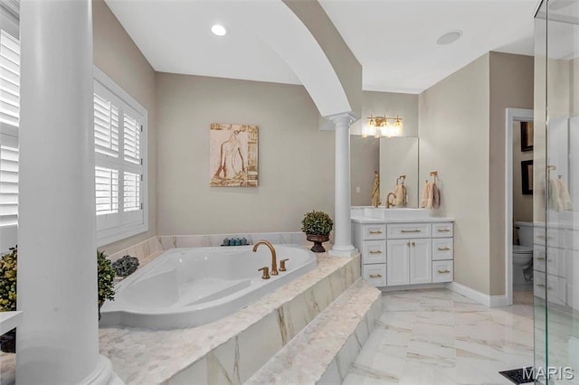 1315 Wildhorse Meadows Dr, Chesterfield, MO 63005 - full bath featuring ornate columns, vanity, a bath, marble finish flooring, and toilet