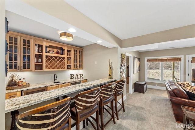 1315 Wildhorse Meadows Dr, Chesterfield, MO 63005 - indoor wet bar featuring light colored carpet, baseboards, recessed lighting, and beverage cooler