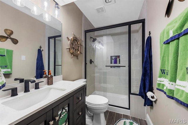 1315 Wildhorse Meadows Dr, Chesterfield, MO 63005 - bathroom with toilet, vanity, a stall shower, and tile patterned floors