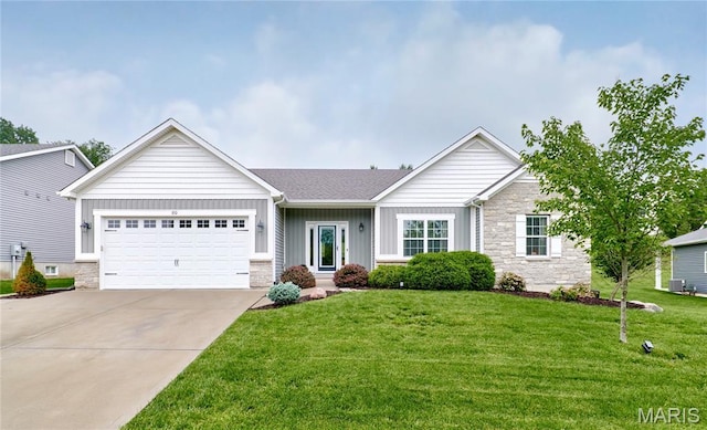 1810 Barclay Bluff Ct, Wentzville, MO 63385 - ranch-style home featuring stone siding, board and batten siding, an attached garage, concrete driveway, and a front yard